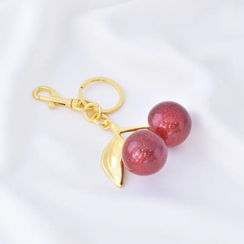 Llavero Cereza / En Baño De Oro 24K. Marca Brazz By Roel.